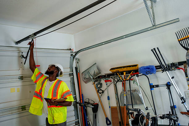 Professional Garage Door Panel Replacement technician working in Hudsonville, MI